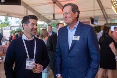 John Downs (right) mingles with attendees at this year's SOTIC in Miami. Pic: NCA