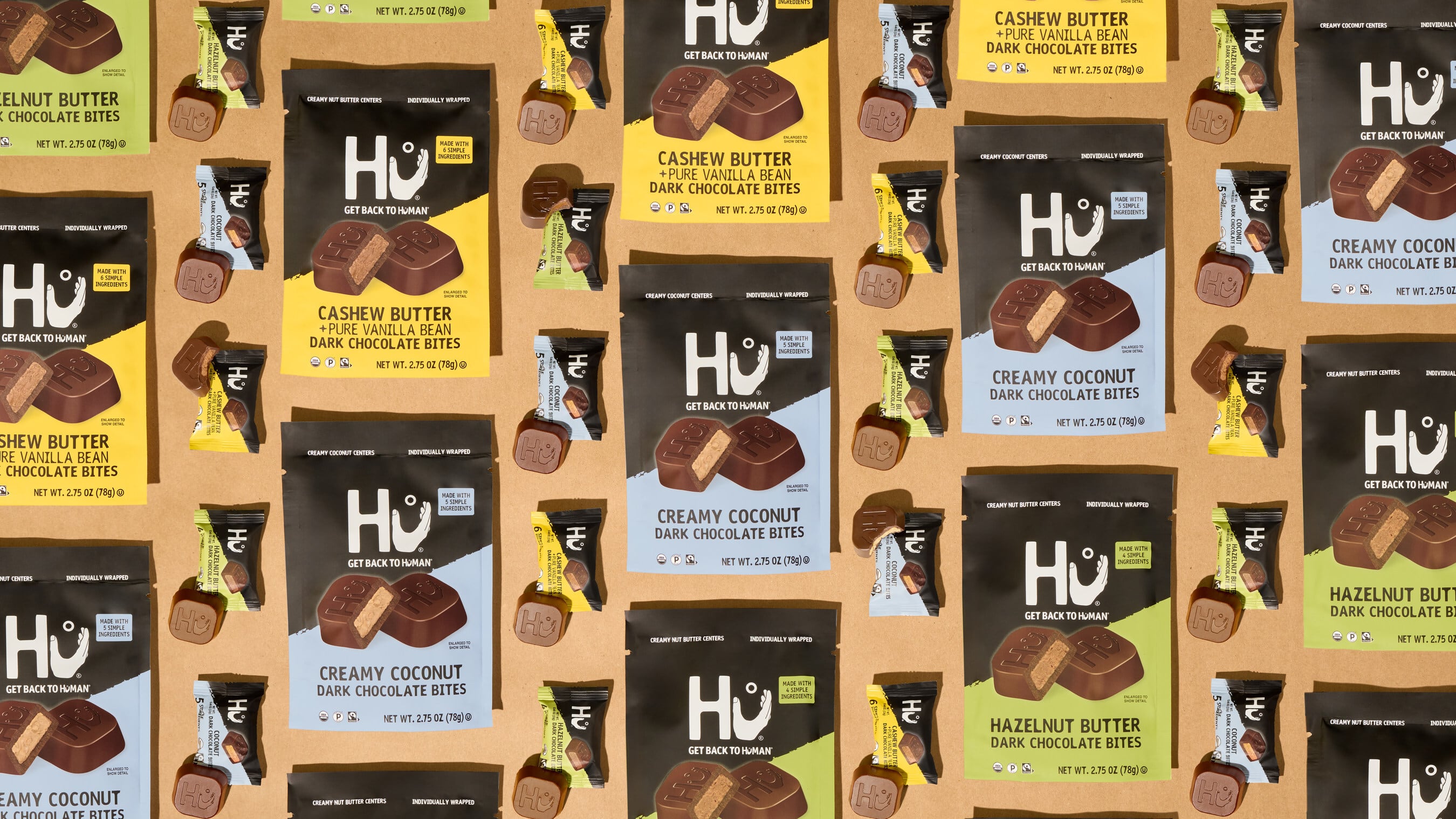 Marketing imagery for chocolate brand Hu's news product line of individually wrapped chocolate bites.