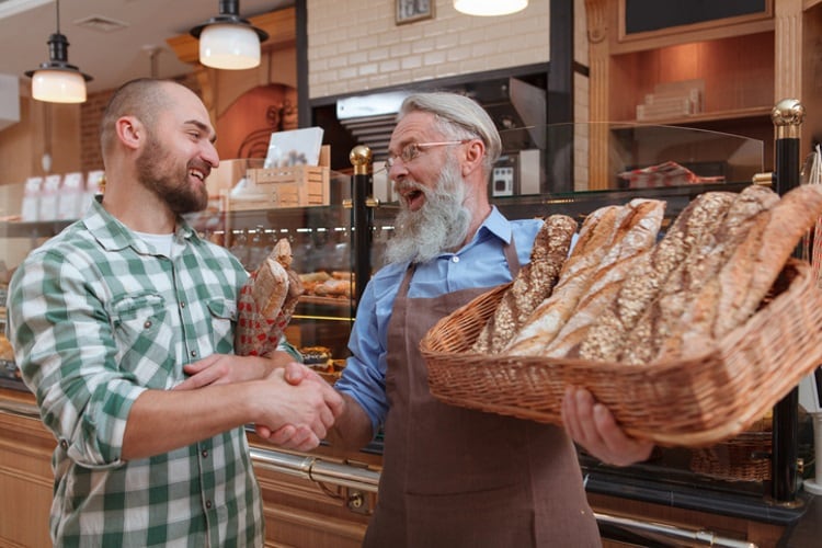 Baker-shaking-hands-with-consumer-Ilhor-Bulyhin.jpg