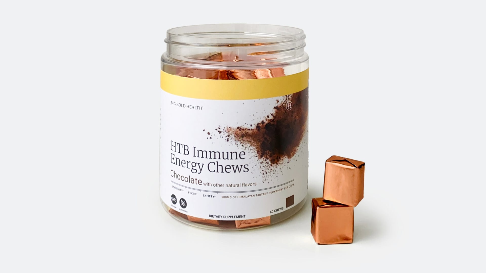 A still life of Big Bold Health's HTB Immune Energy Chews with two of the wrapped chews laid out on the counter.