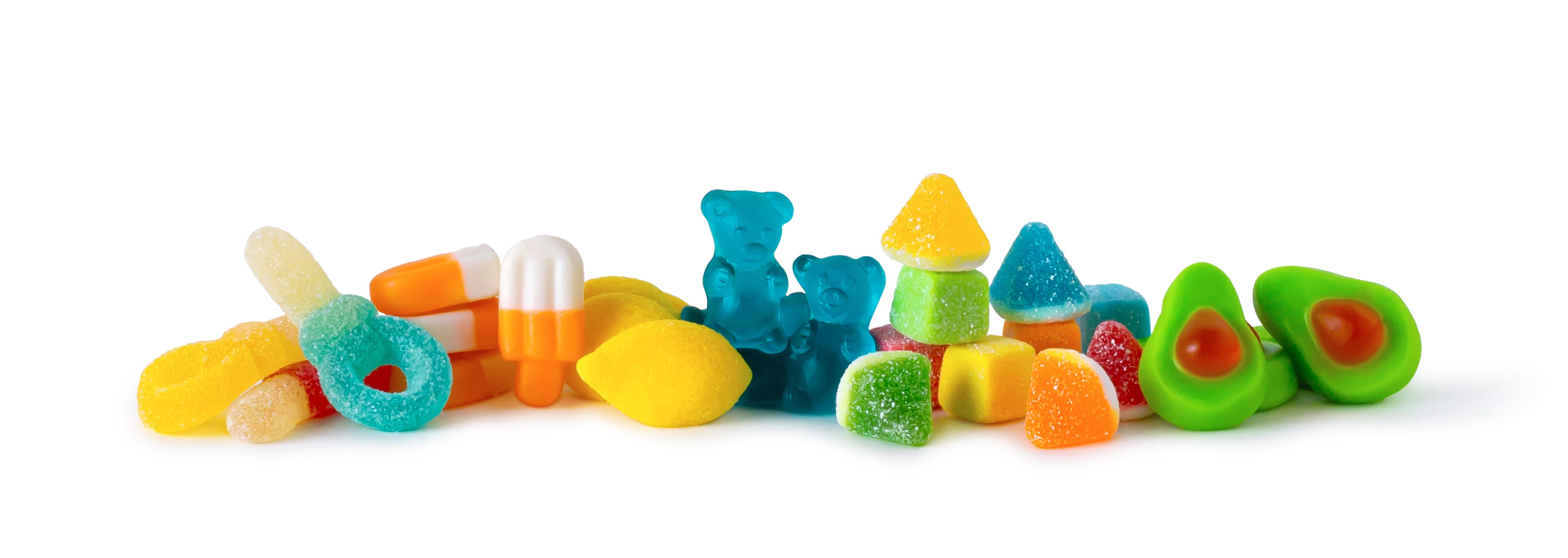 Assorted Clever Candy gummies including avocados, pacifiers, spicy bears, and lemons displayed in a colourful bulk bin.