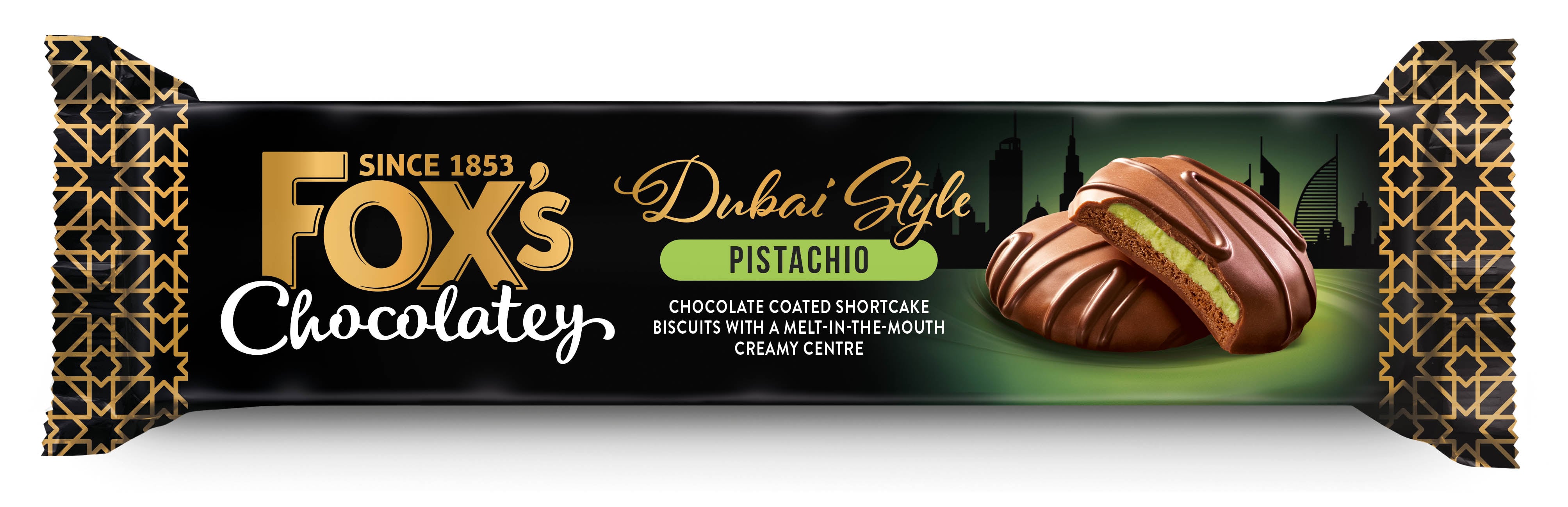 Close-up of Fox’s Chocolatey Dubai Style Indulgent Creams with pistachio filling and chocolate coating, in premium packaging.
