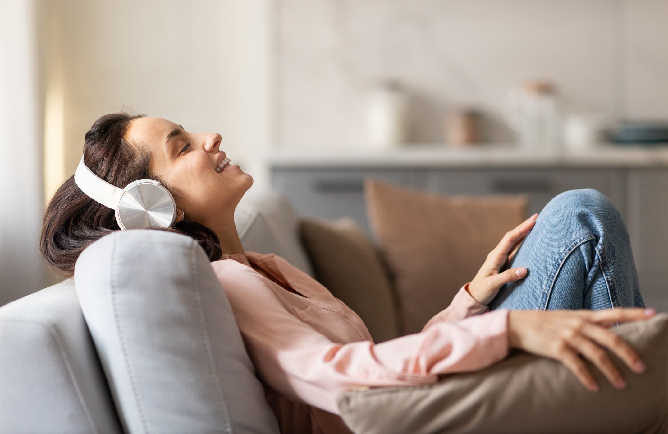 Woman relaxing with music on headphones