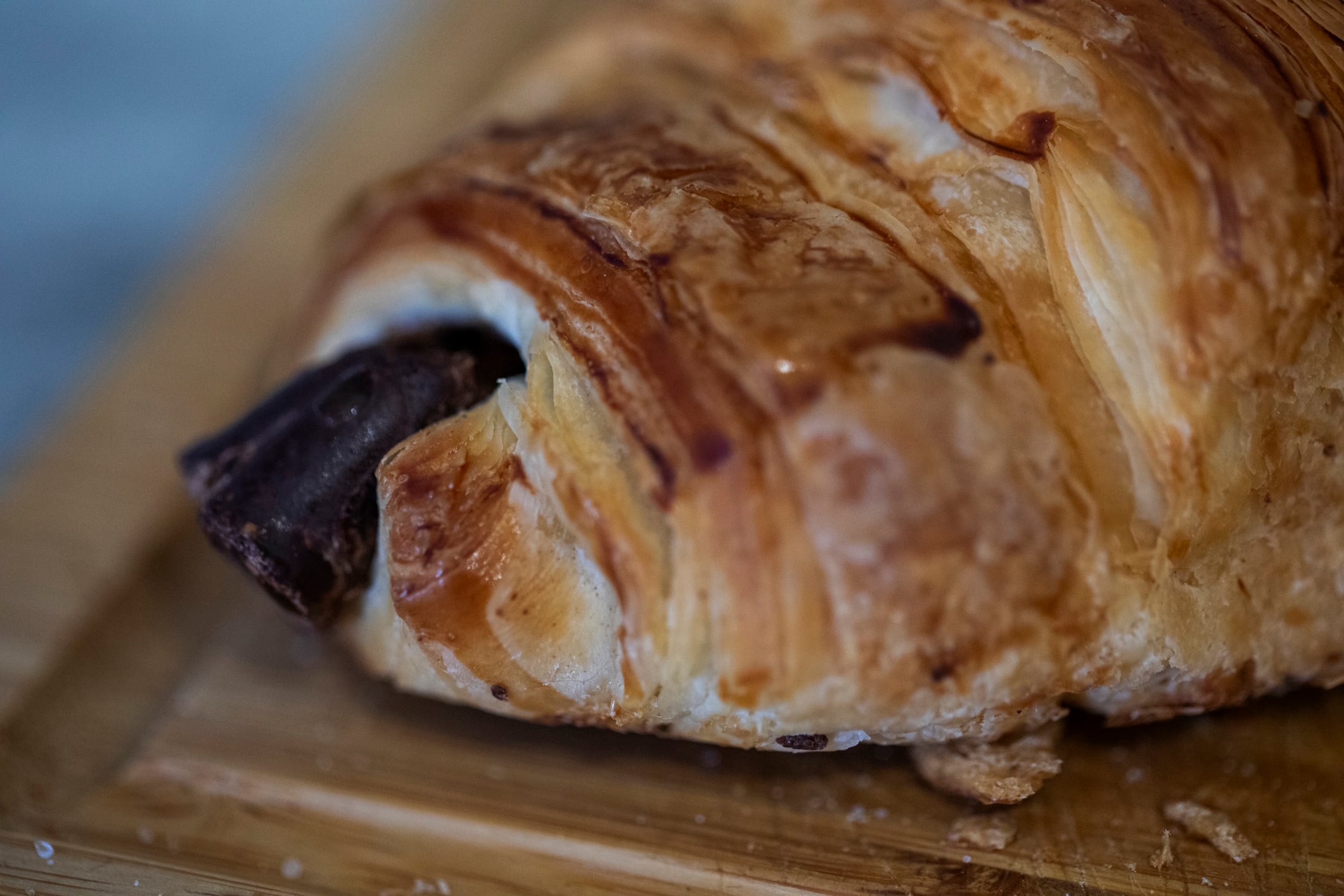 Close-Up of a Chocolate-Filled Croissant on a Wooden Board DarioGaona GettyImages