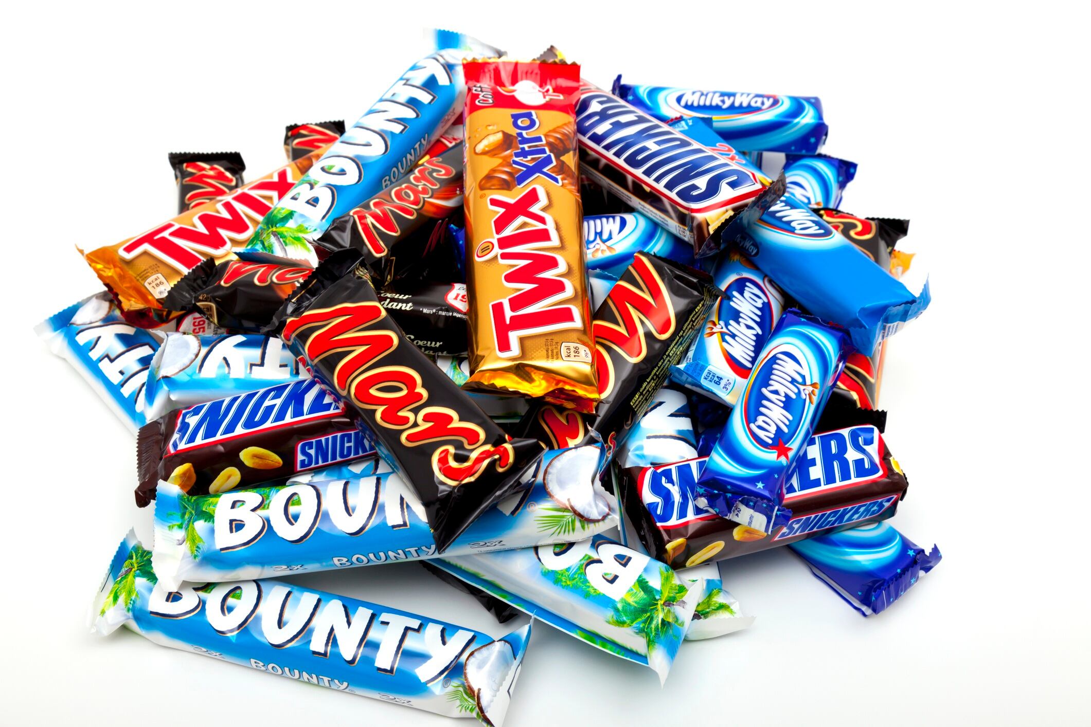 Close up of Bounty, Twix, Snickers, Milky Way and Mars chocolate bars.