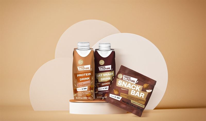 Packshots on a brown background of Fazer's newly launched Snack Bars and high protein banoffee and cocoa drink.