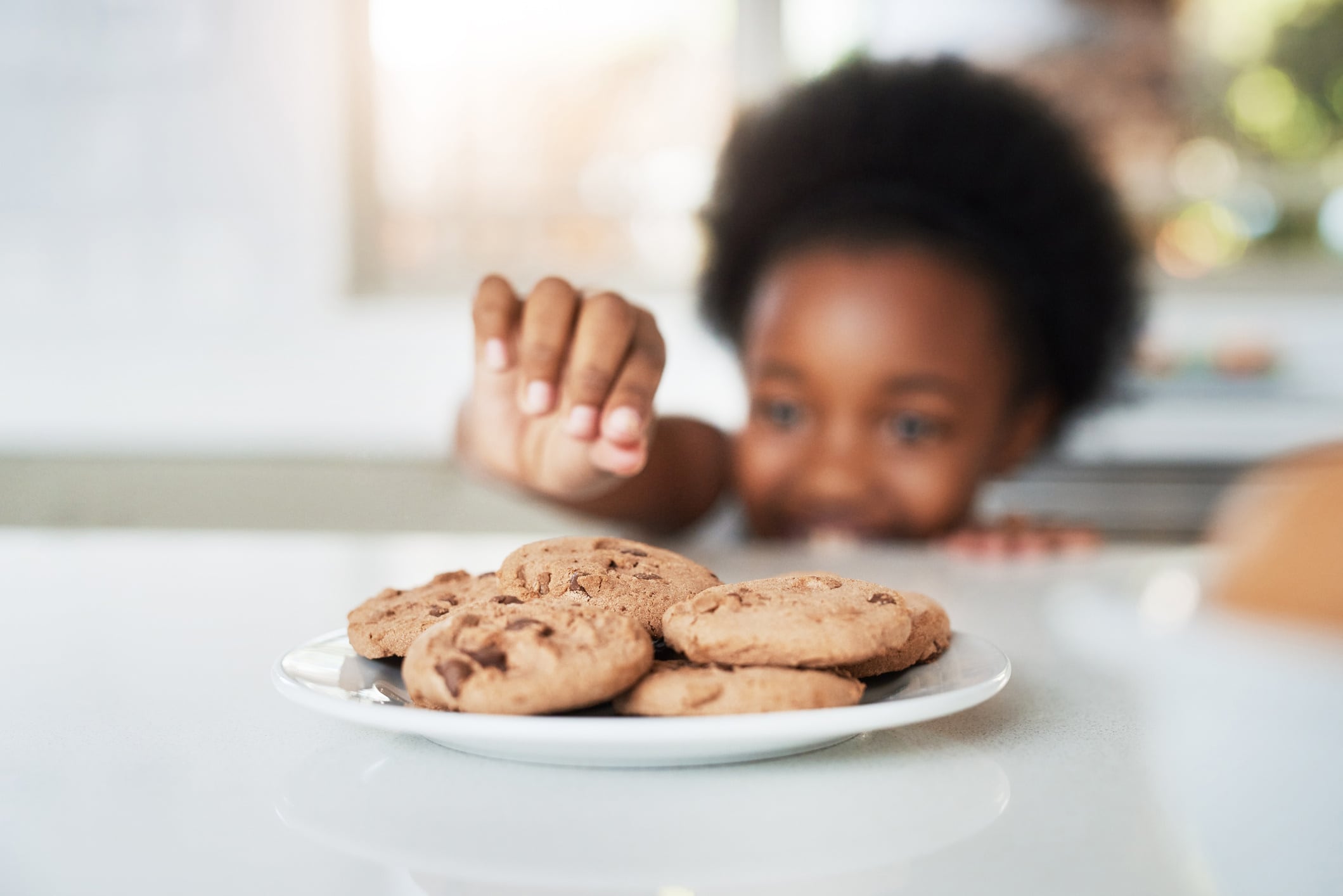 Young boy can't resist biscuits
