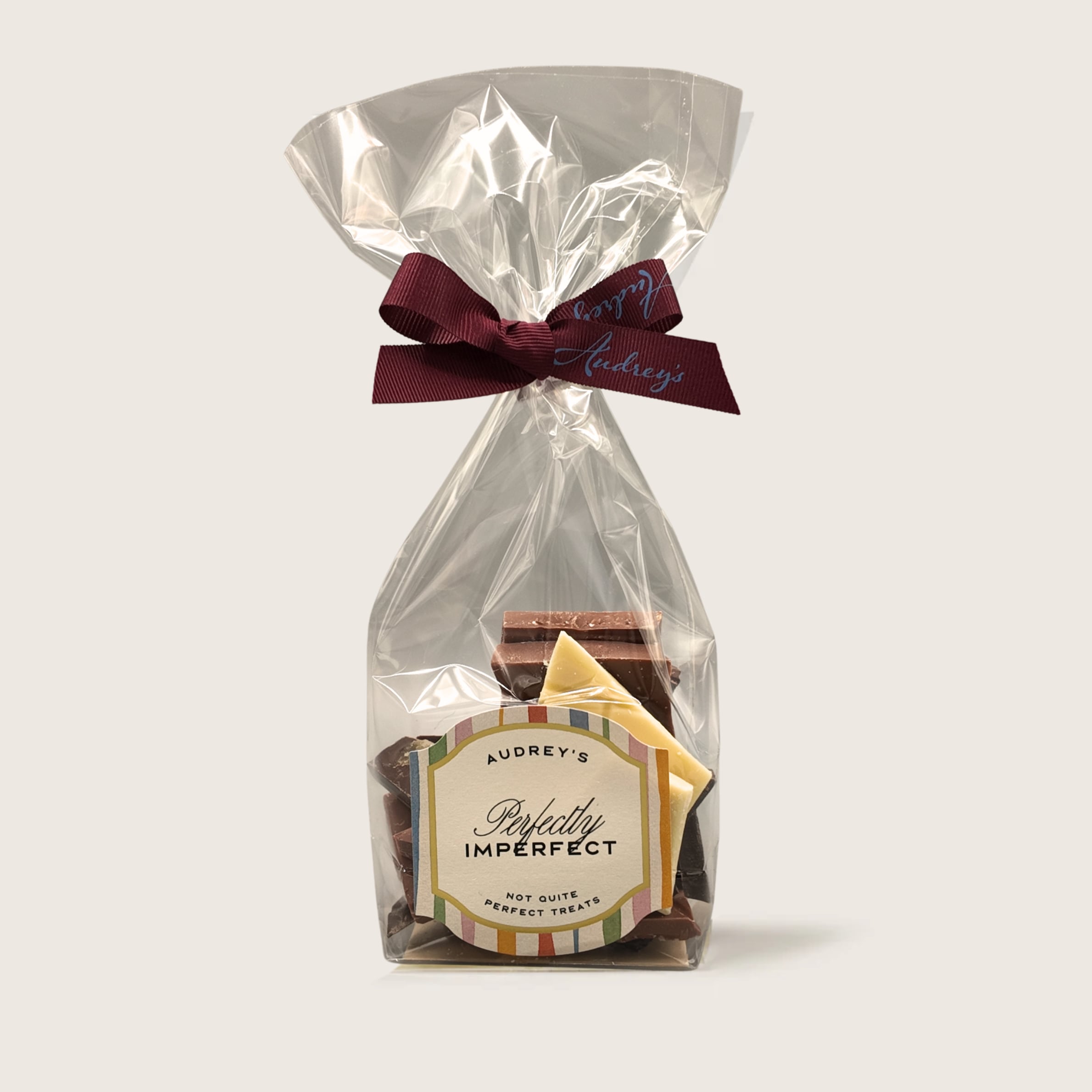 Mixed selection of handmade chocolates in a bag.