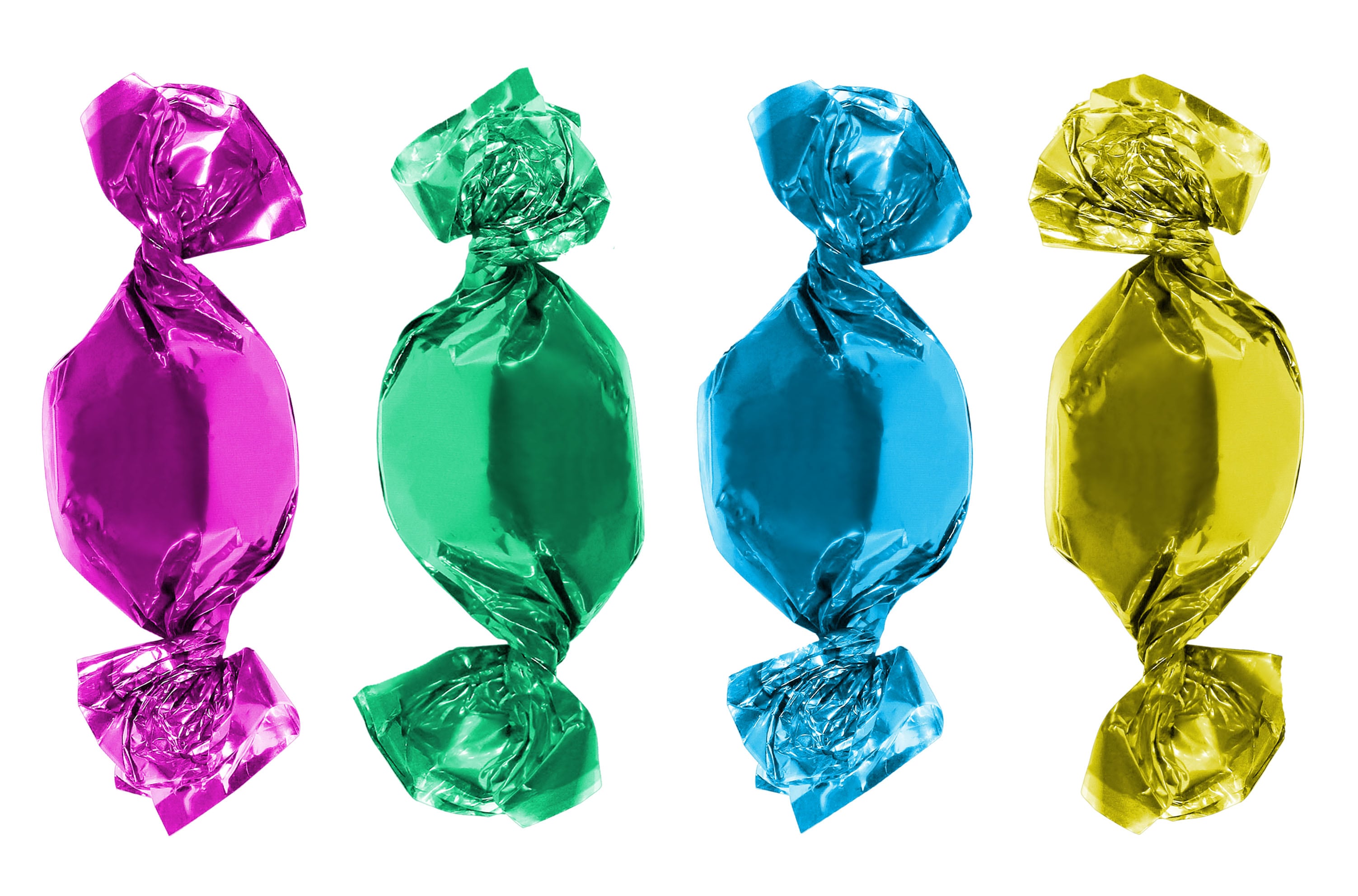 Collection of sweets in multi-colored foil packaging on an isolated white background.