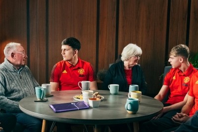 Manchester United players chat with elderly fans before the club's match with Watford. Pic: manutd.com