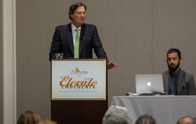 NCA CEO John Downs addresses delegates at  Fine Chocolate Industry Association’s Elevate Chocolate event in San Francisco. Pic: NCA