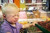 child crying over sweets small