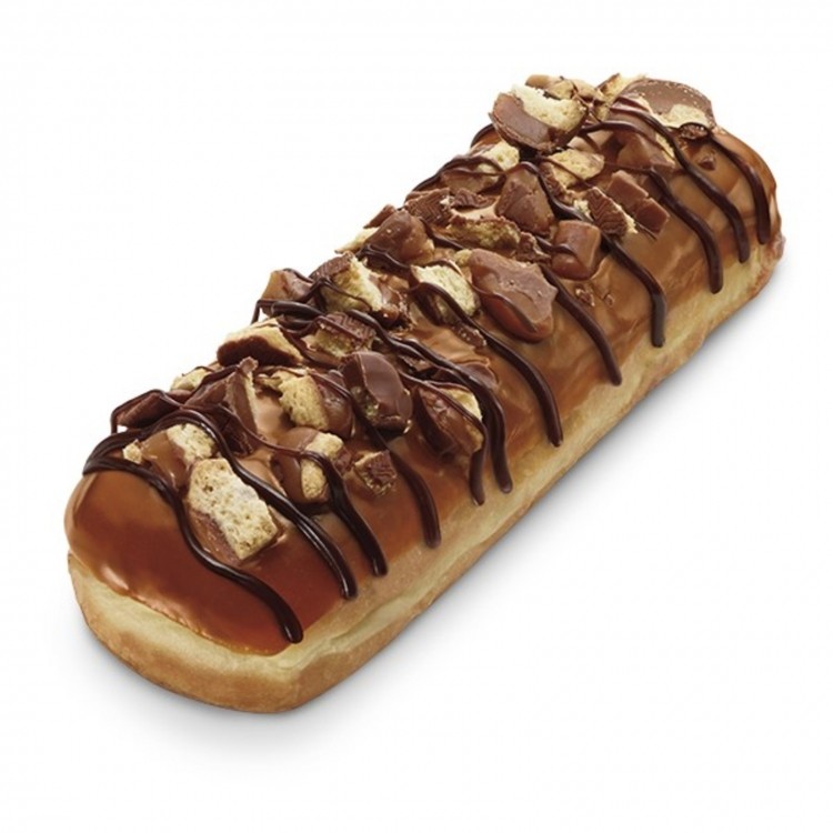 7-Eleven's new Twix donut, covered in caramel and drizzled with chocolate, is rolling out across the US. Pic: 7-Eleven 