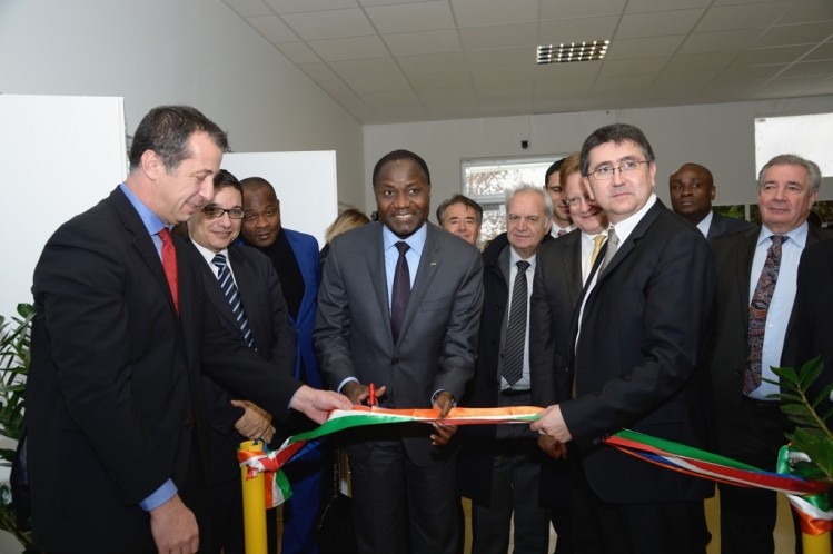 Cémoi CEO Patrick Poirrier (right) opens new R&D center with Ivorian Minister of Agriculture Mamadou Sangafowa Coulibaly (center)