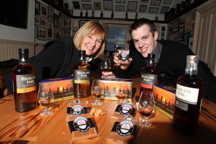 Pat Retson, brand heritage manager, Highland Park Distillery, (left) with Ewan McDill, production manager, Orkney Fudge, (right). Photo credit: Ken Amer, Orkney Photographic. 