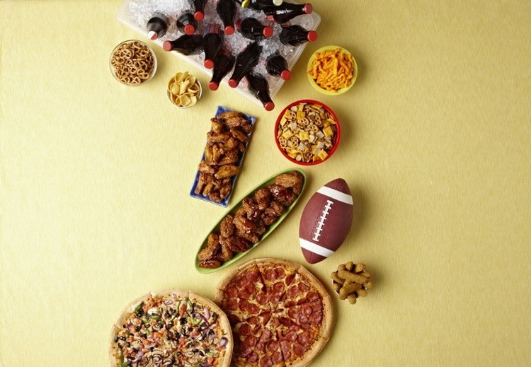 Americans consumed the equivalent of 270 jumbo jets-worth of snacks on Super Bowl Sunday. Pic: GettyImages/Lew Robertson