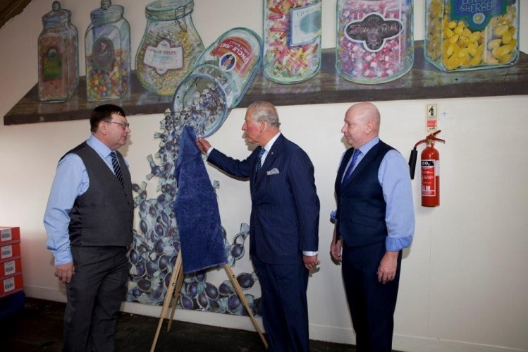 (l-r) John Winnard, Prince Charles and Antony Winnard during the Prince’s visit to the factory. Photo: Uncle Joe's.