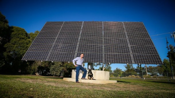 Barry O’Sullivan, a general manager at Mars Australia, inspects one of Total Eren's solar farms. Photo: Mars Australia