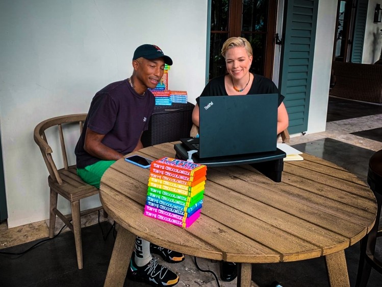 Pharrell Williams with Tony's head of Marketing, Thecla Shaeffer after the partnership announcement last year. Pic: Tony's Chocolonely