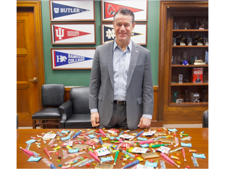 Indiana Senator Todd Young behind the coveted US Senate Candy Desk. Pic: NCA