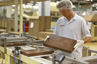 Barry Callebaut has recorded volume growth in all regions, while the overall chocolate market declined. But profits for its cocoa arm have been hit by weakening demand.