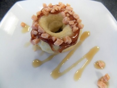 Bacon fudge bits on a donut. Pic: Pecan Deluxe Candy