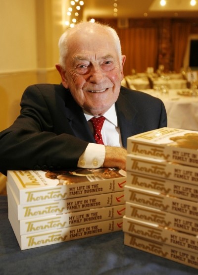 Peter Thornton with copies of his book 'Thorntons - My Life in the Family Business'