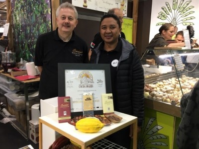 Neil Kelsall and Hery Andriamanpianina from Chocolat Madagascar celebrate their ICA gold award at the Salon du Chocolat. Pic: ConfectioneryNews