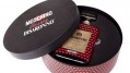 This heart-decorated DiSaronno bottle comes in a tin for gifting.