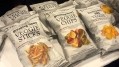 The Daily Crave's savory snacks harness the matte-packaging trend with bags mimicking the look of newsprint.